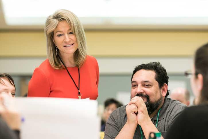 Michelle Marks working with colleagues at the Student Experience Redesign workshop.
