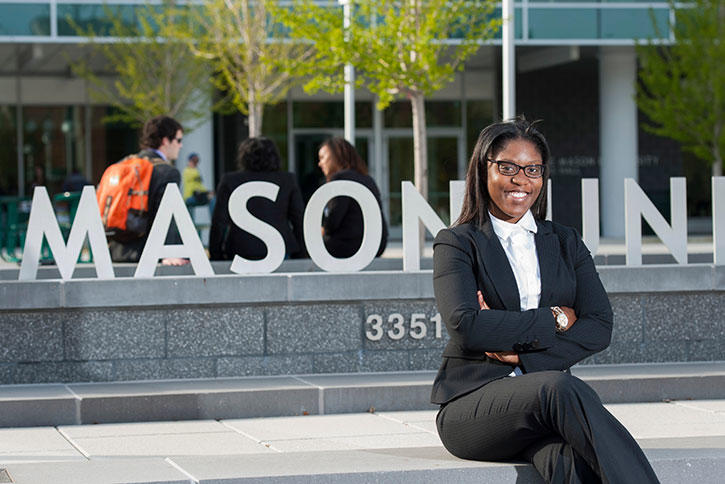 Graduate student Rebecca Ijiti attends classes at the Arlington Campus. Graduate courses there are held in the evening so students can work toward an advanced degree while still employed.