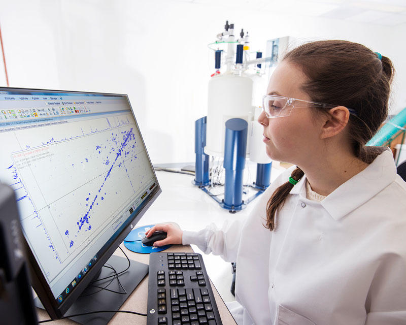 Researcher observes statistical results at George Mason University's Institute for Biomedical research on the SciTech campus