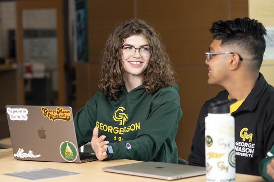 students with laptops in Horizon Hall