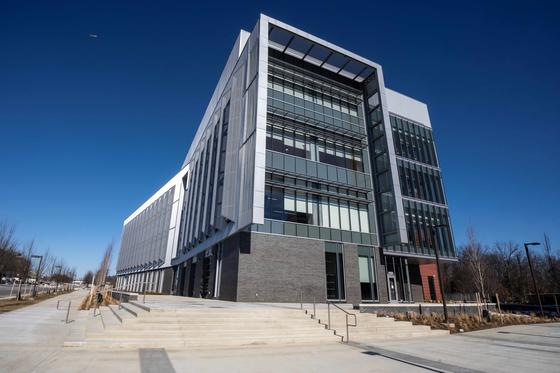 View of the new four-story Life Sciences and Engineering Building at the SciTech Campus on a sunny day.